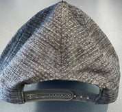 Gray and blue patterned cap on a gray background