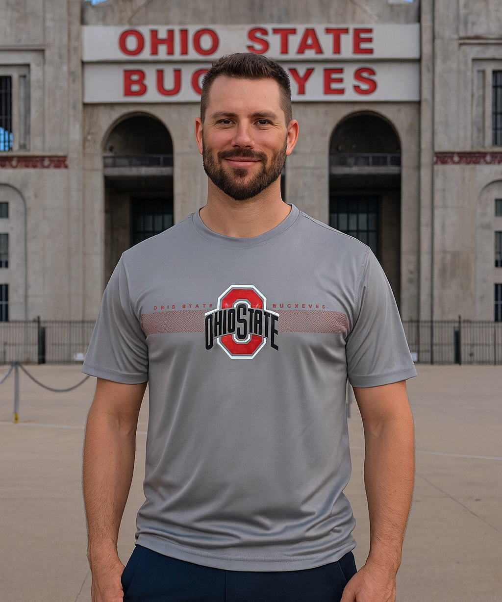 Man wearing an Ohio State t-shirt in front of Ohio Stadium