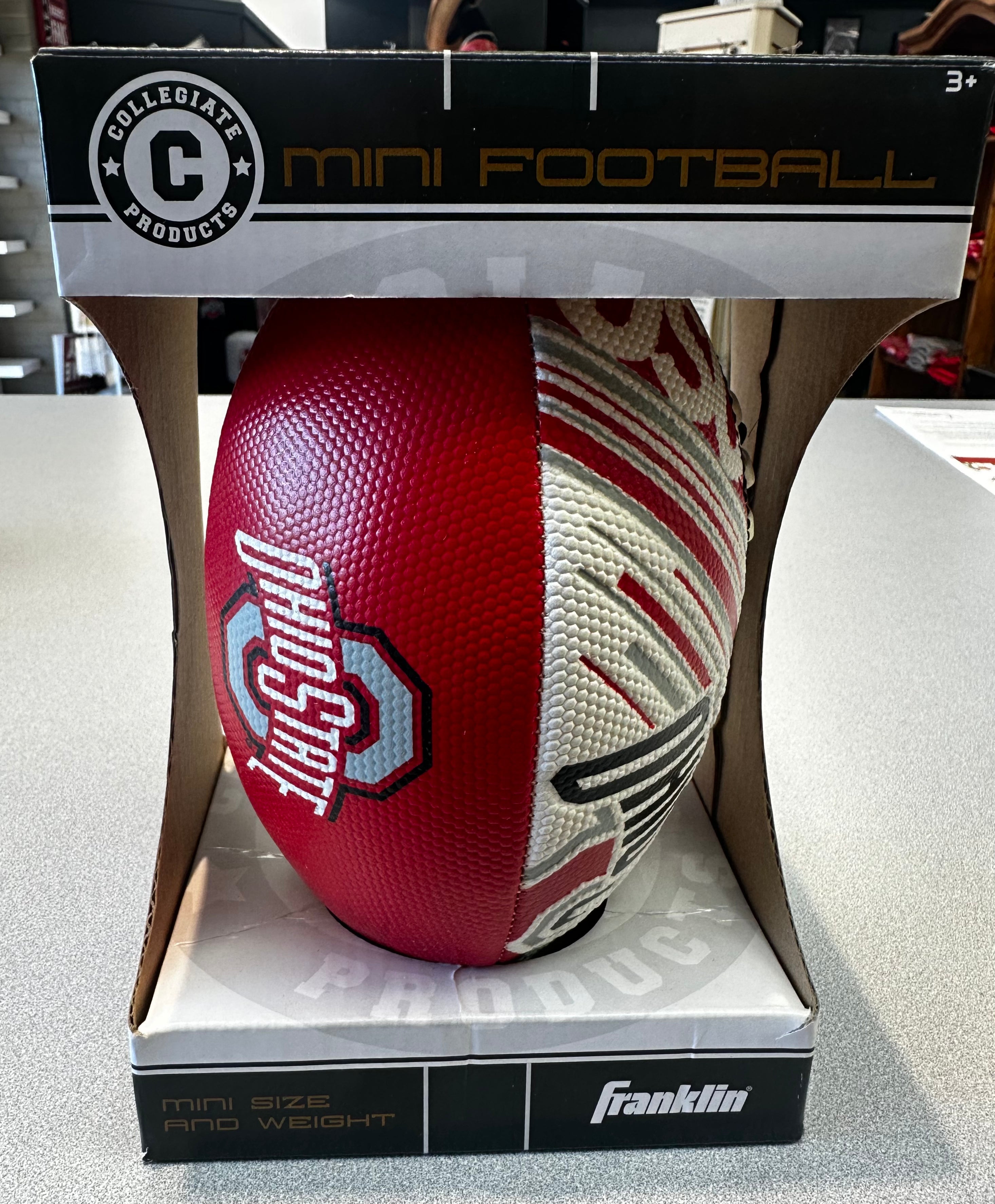 Red and white mini football in packaging with Franklin Sports branding
