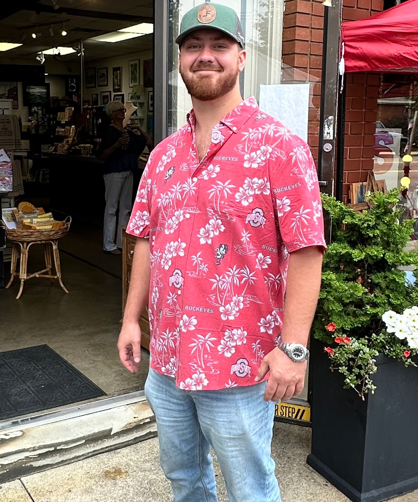 man standing outside store wearing OHIO STATE KEKAI RED HAWAIIAN BUTTON-UP WITH BRUTUS AND LOGO 