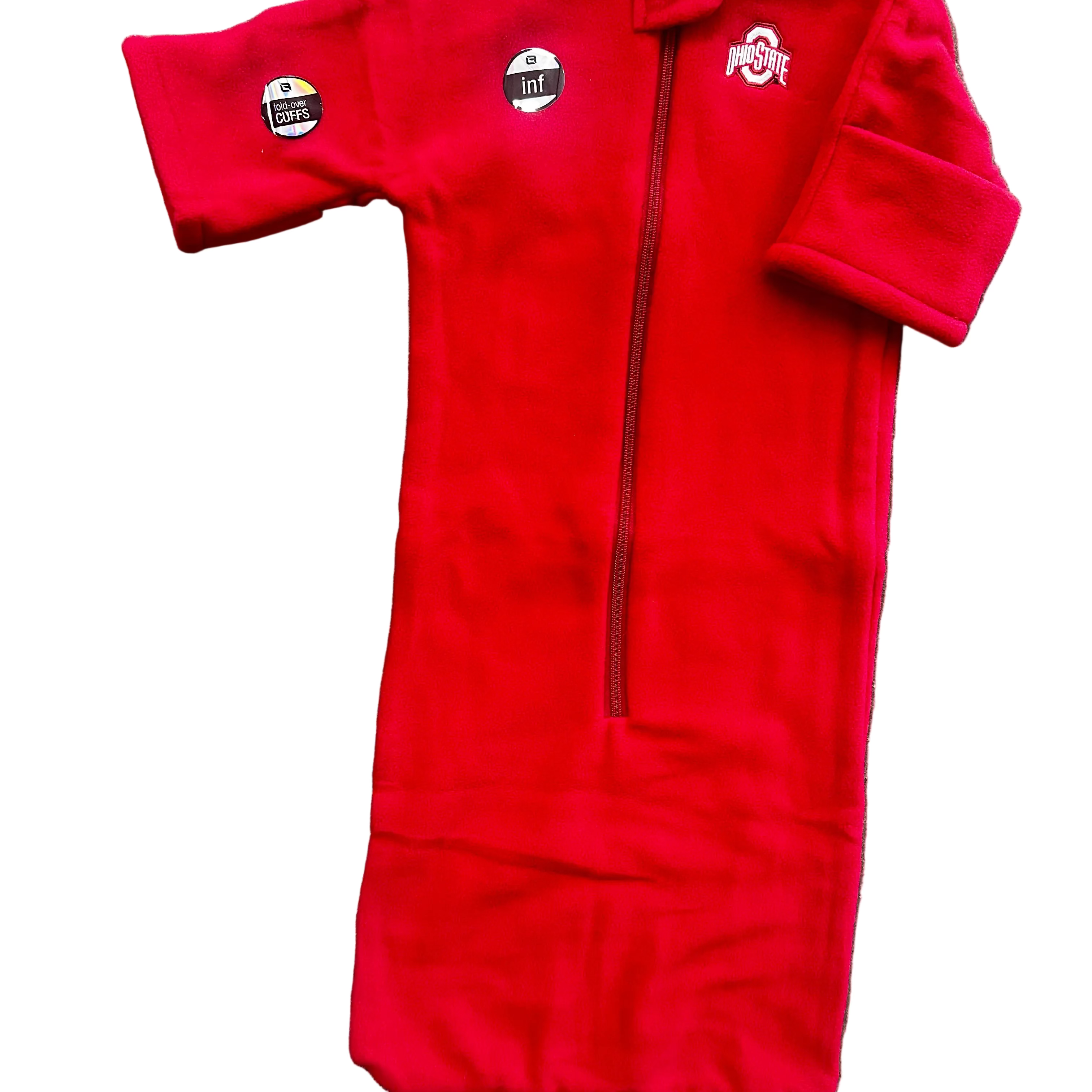 Red baby sleeping bag with logos on a gray surface