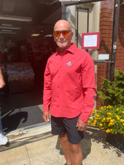 staffer wearing buckeye logo long sleeve shirt, button down