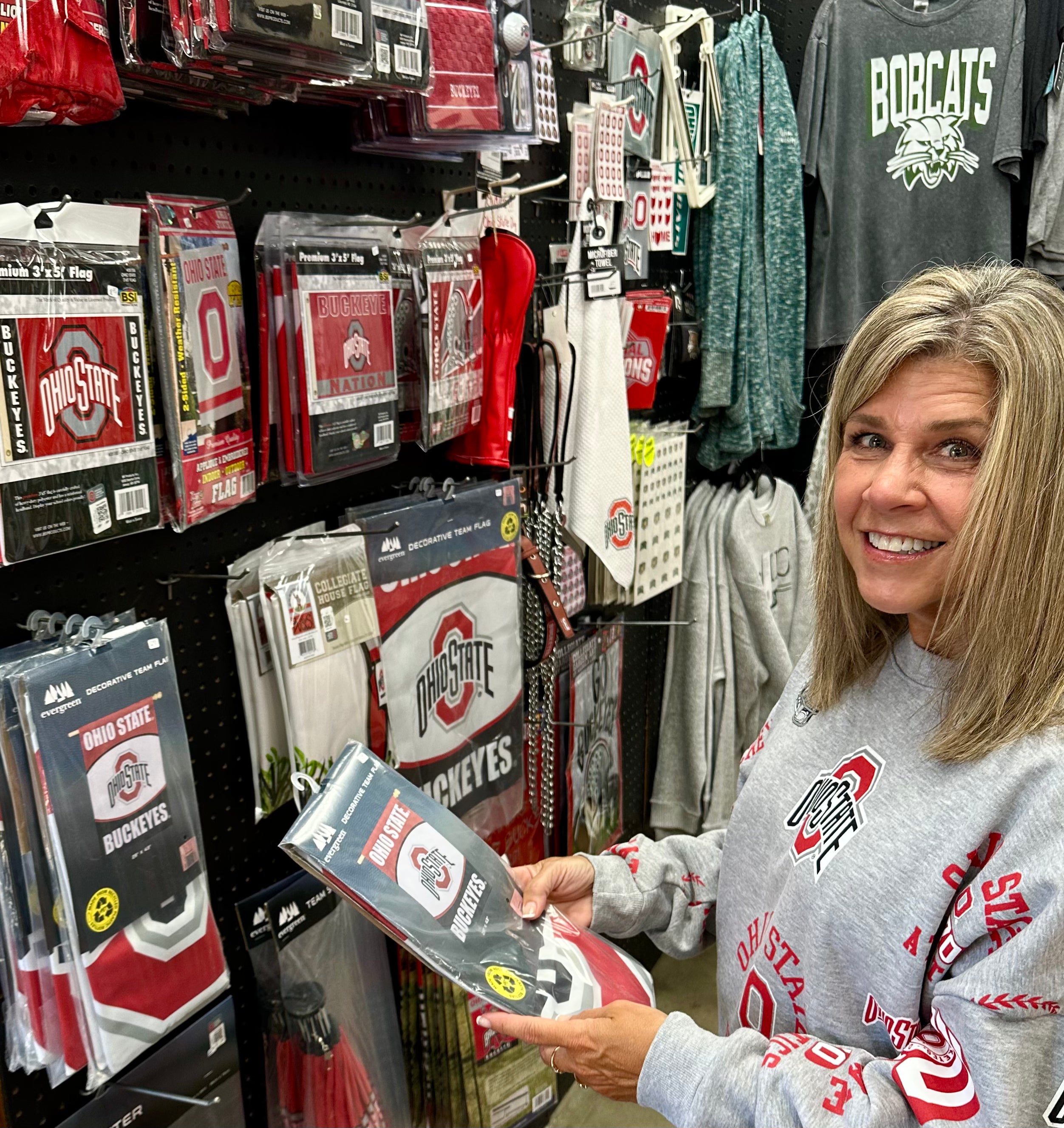 staff wearing sweatshirt