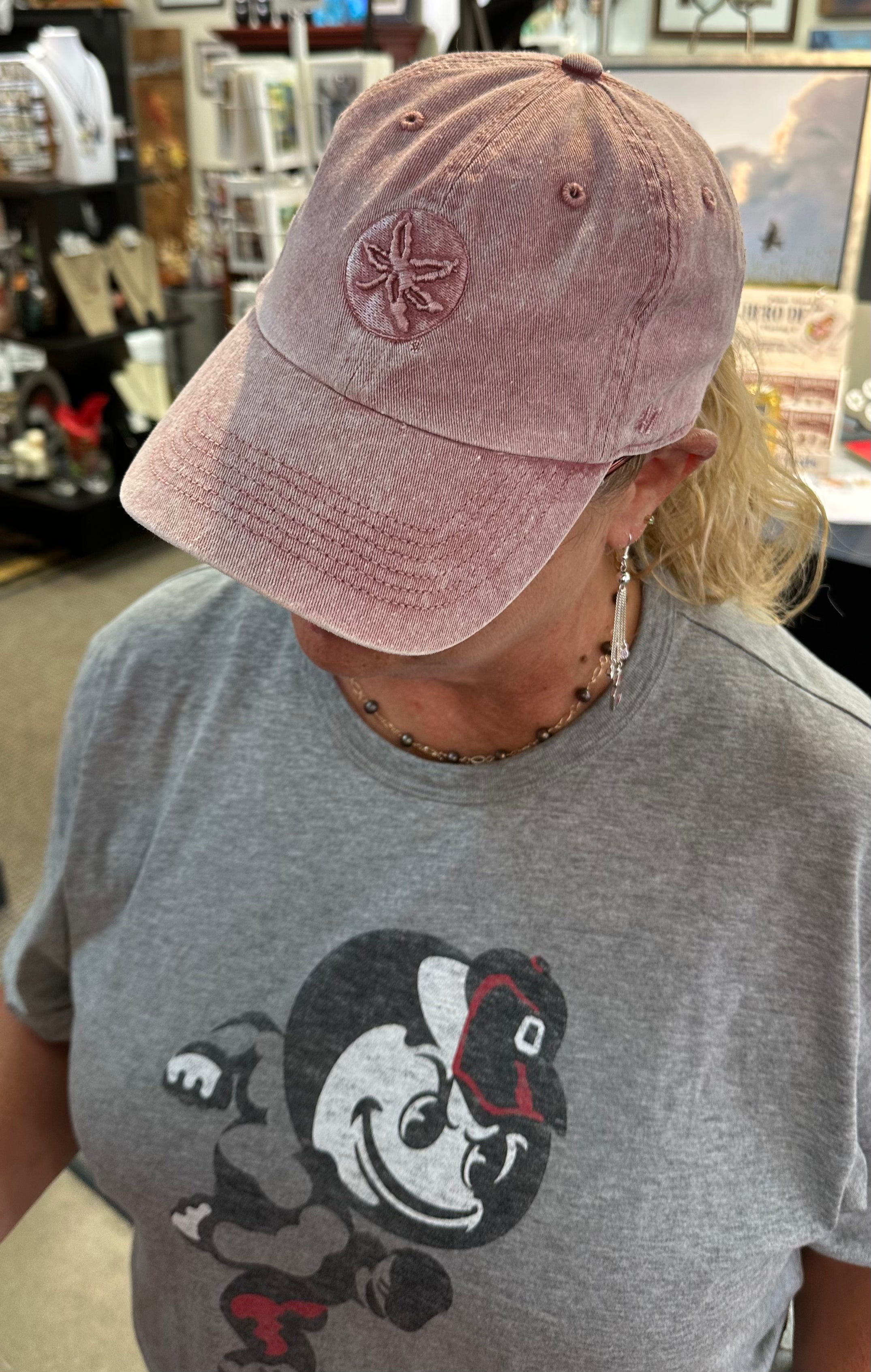 misty hat on staff at store