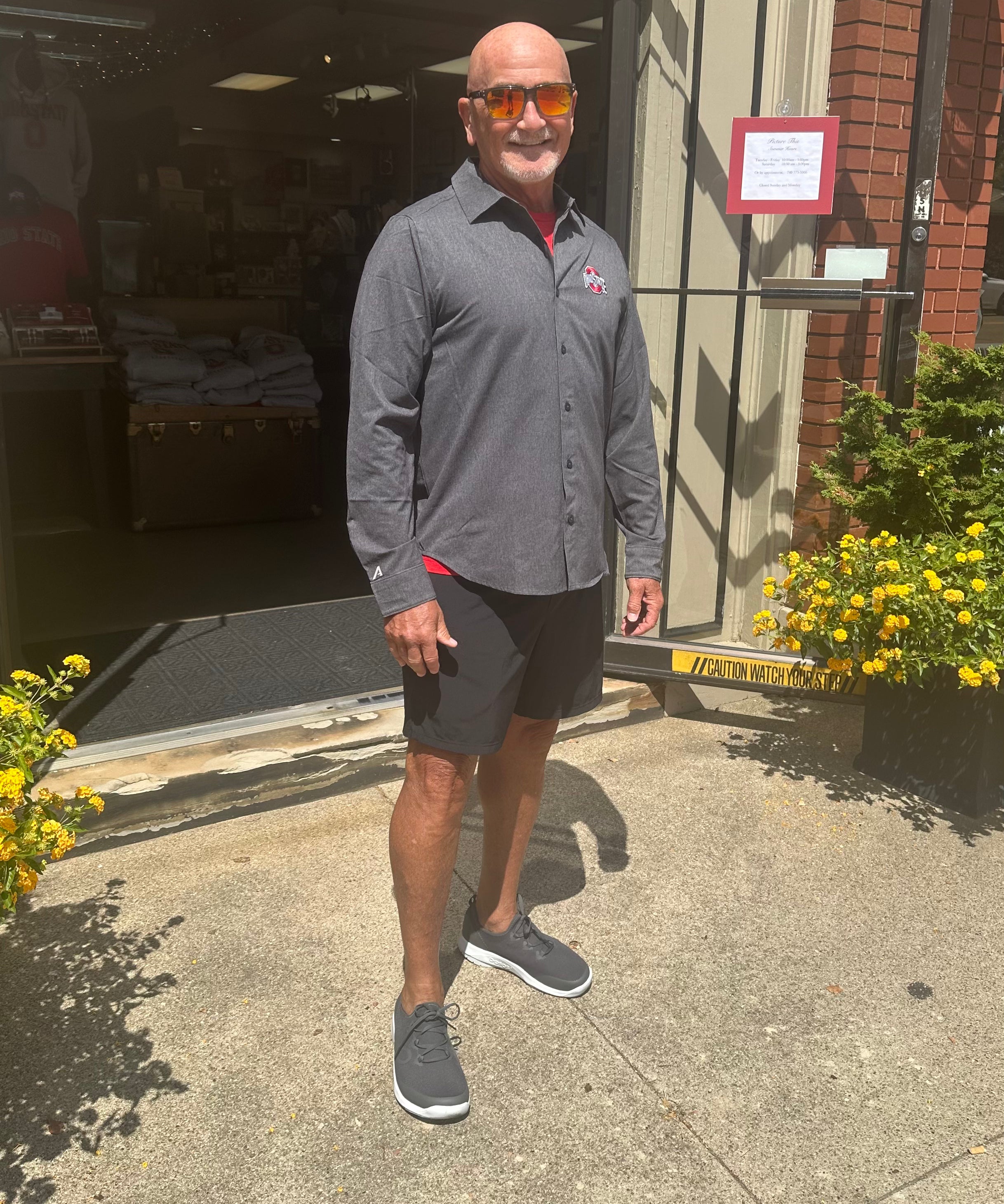 Mens shirt, outside store, staffers wearing shirt