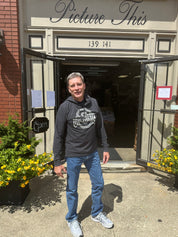 staffer wearing sweatershirt