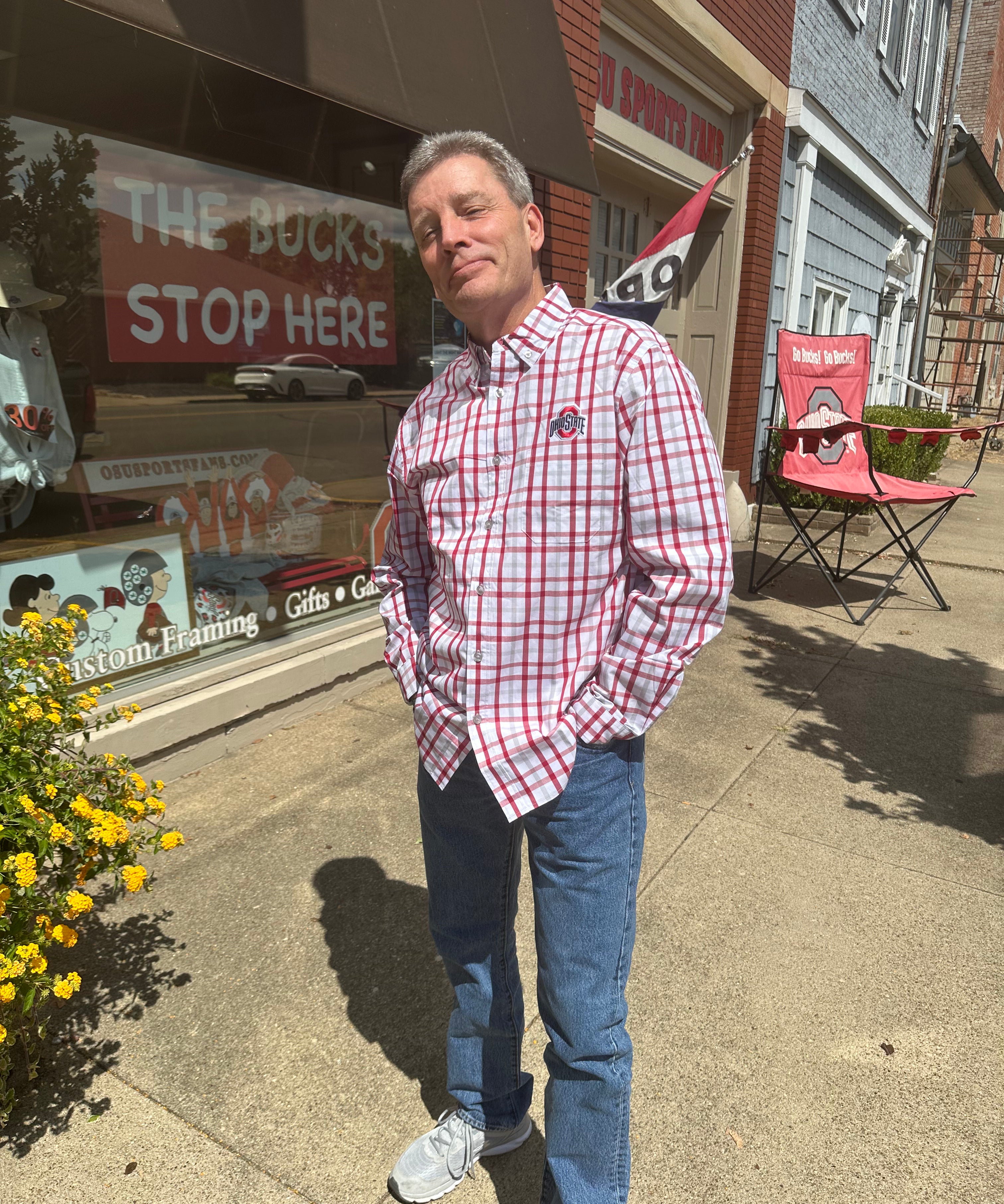 buckeye fan wearing button down striped shirt