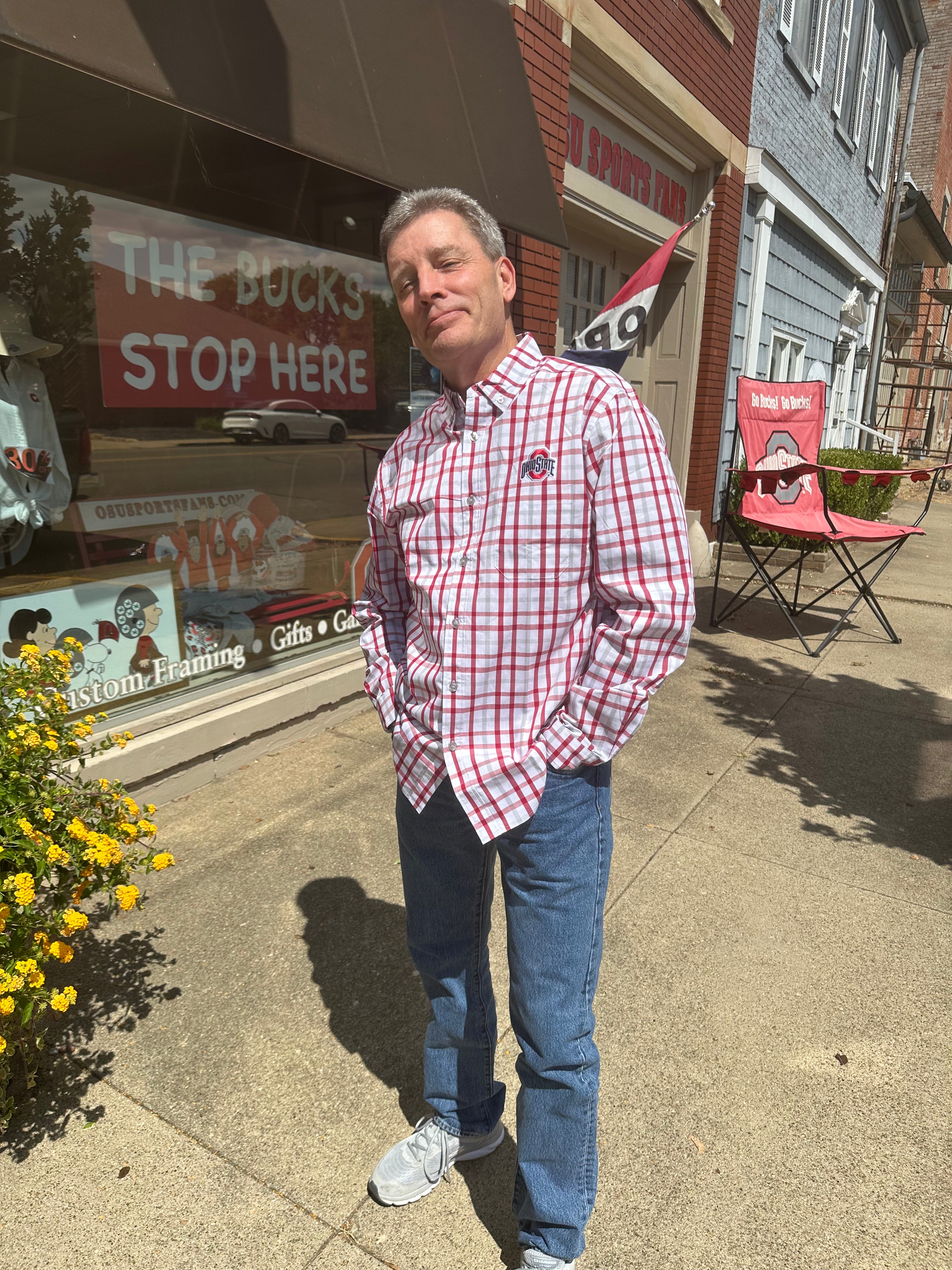 buckeye fan wearing button down striped shirt