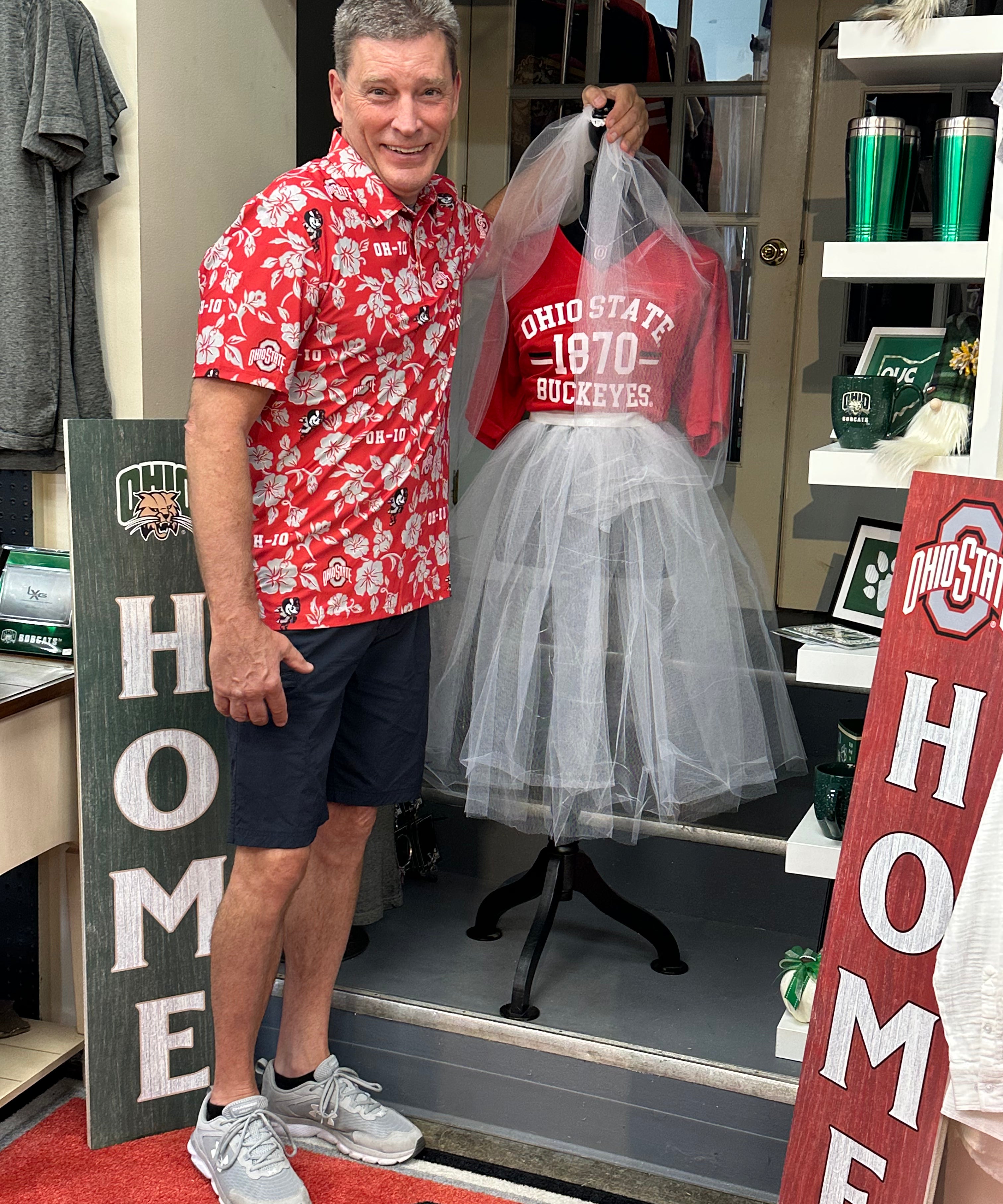 Outside man wearing the PERFORMANCE POLO