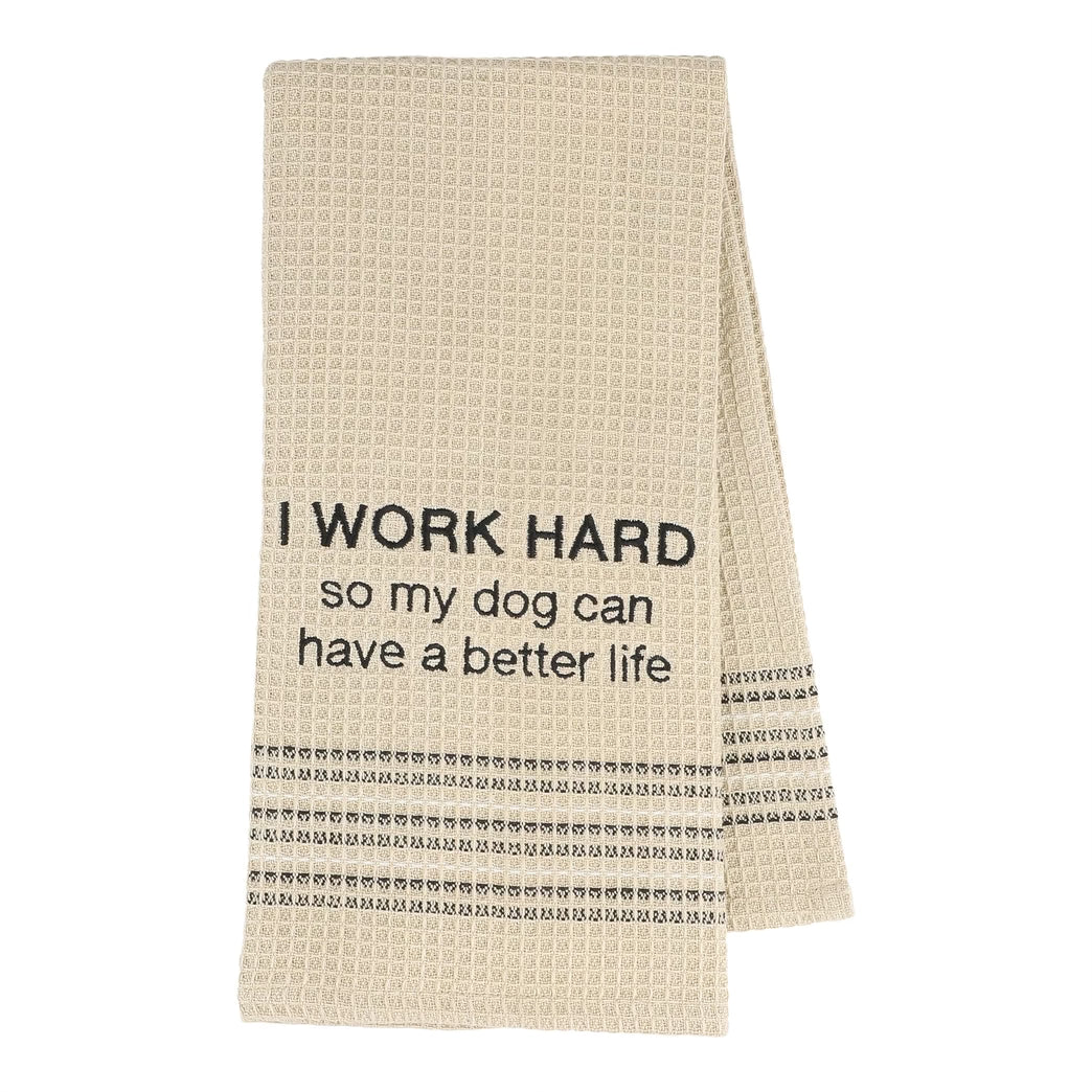 Beige towel with text 'I WORK HARD so my dog can have a better life' on a white background