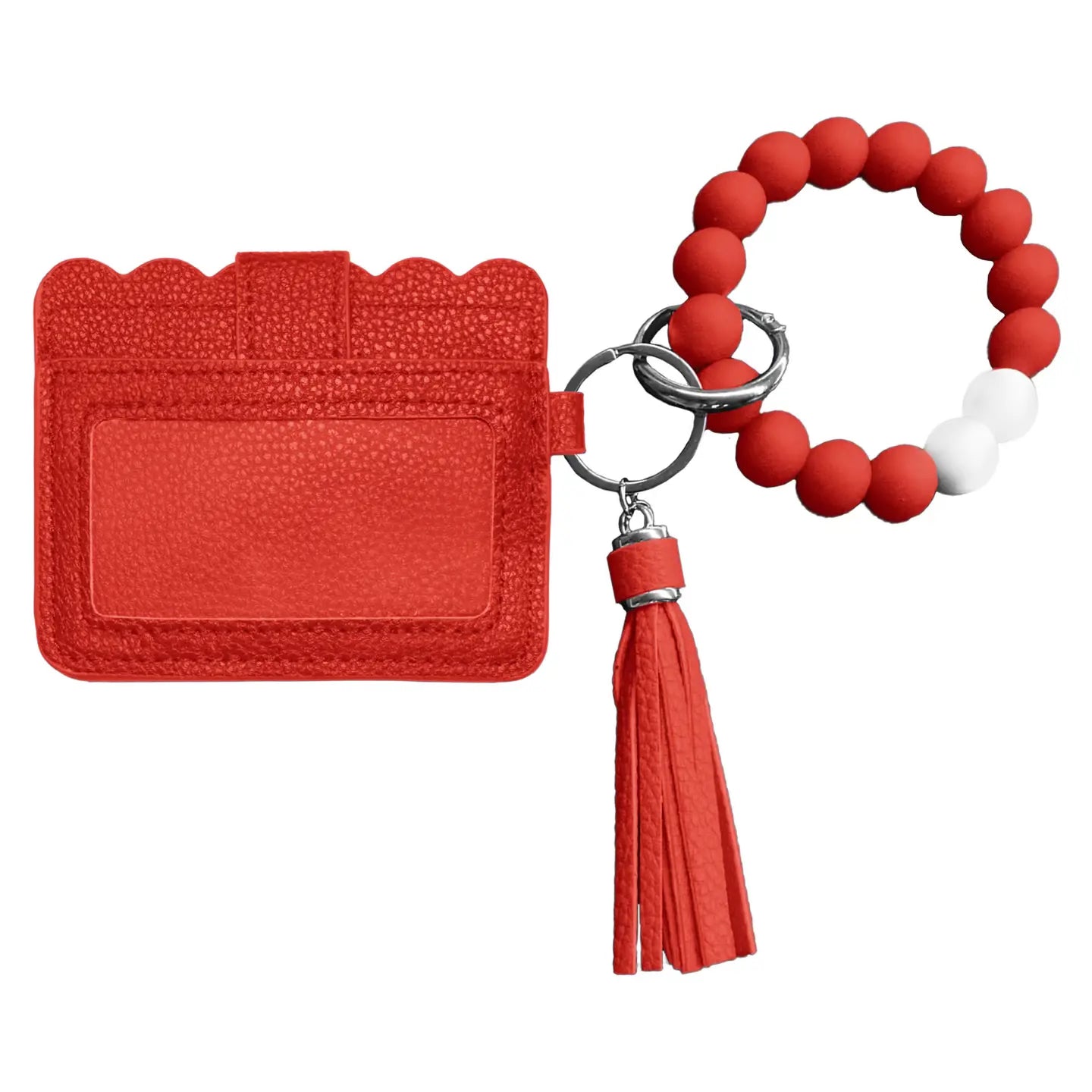 Red cardholder with keychain and tassel on a white background
