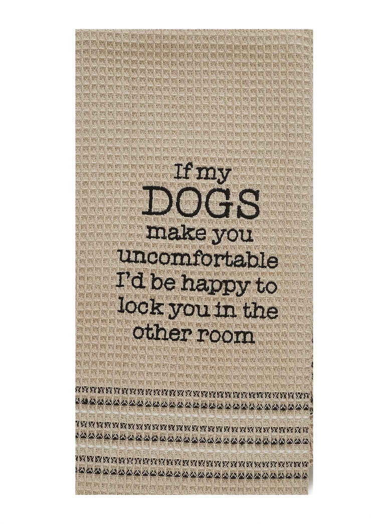 Textile with humorous message about dogs on a plain background