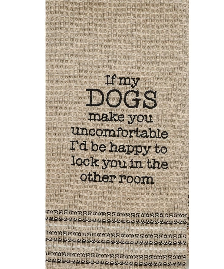 Textile with humorous message about dogs on a plain background