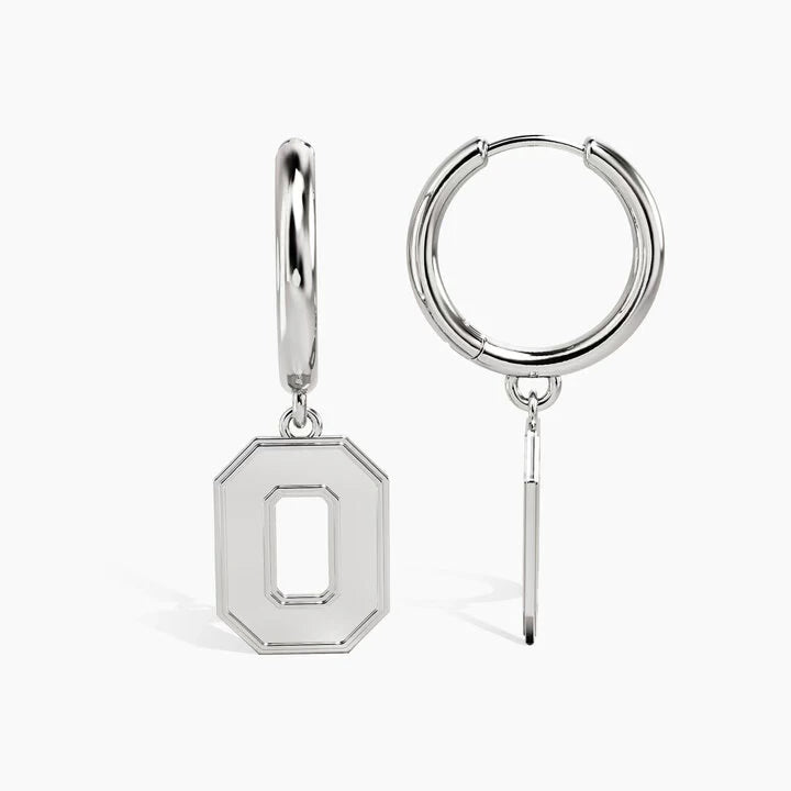 A pair of silver letter O hoop drop earrings, showing both the front view with a geometric octagonal pendant and the side profile with the hinged hoop and dangling bar.