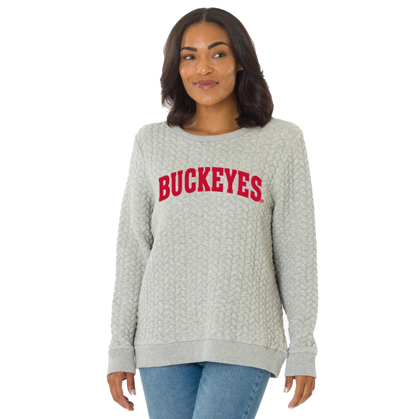 Woman wearing a gray sweatshirt with 'Buckeyes' printed in red on a white background