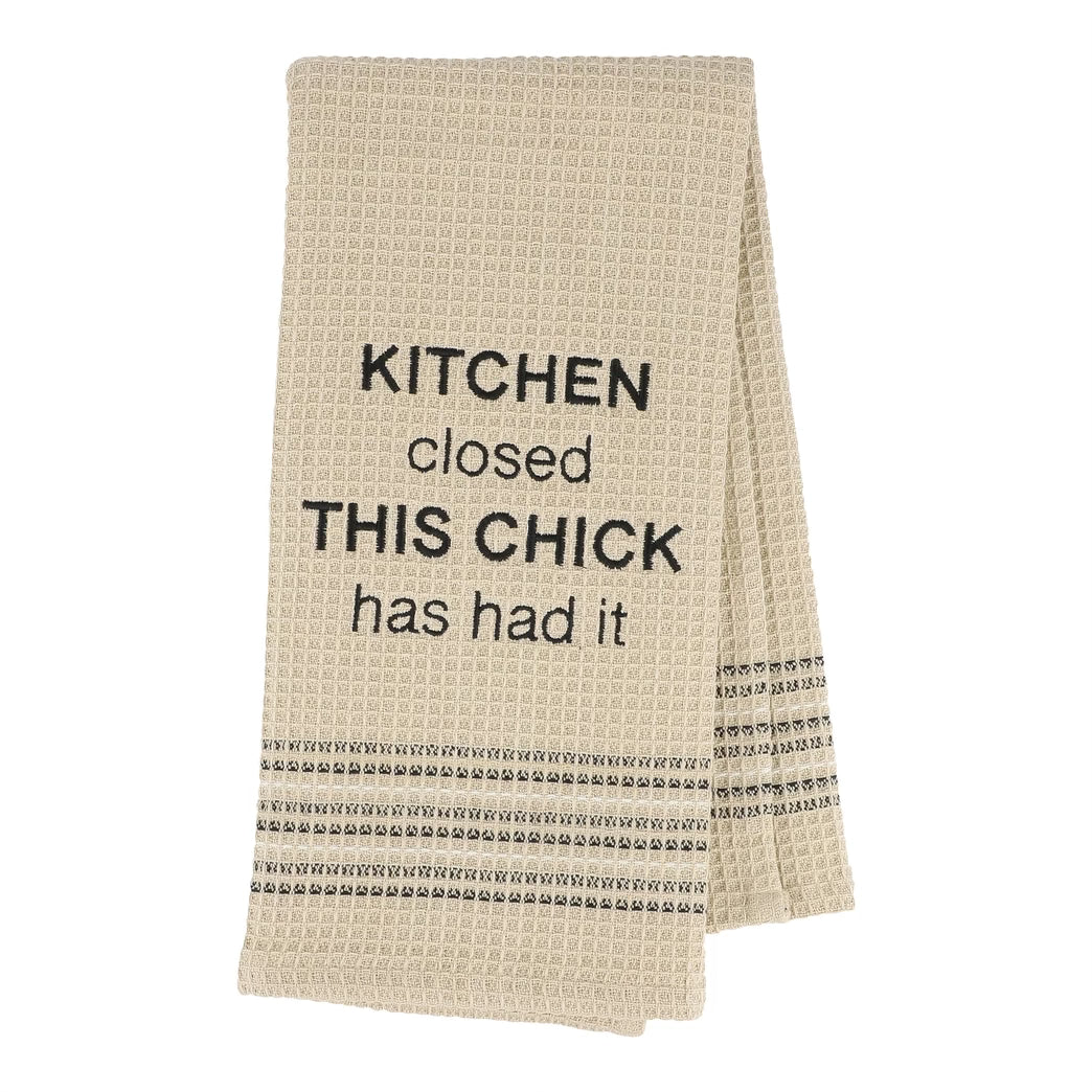 Beige kitchen towel with black text on a white background